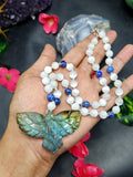Selenite and Lapis Lazuli Bead Mala Necklace with Labradorite Phoenix Pendant - Symbolism and Artisan Craftsmanship