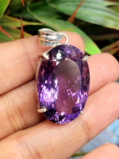 Amethyst Faceted Oval Pendant in Sterling Silver - Captivating Beauty and Artisan Craftsmanship