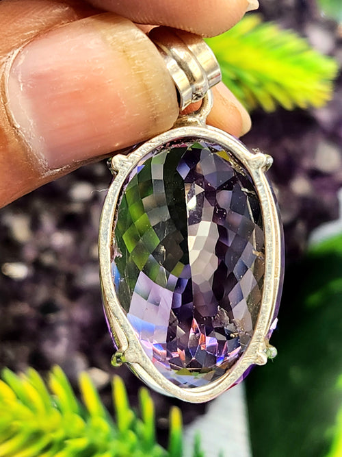 Amethyst Faceted Oval Pendant in Sterling Silver - Captivating Beauty and Artisan Craftsmanship