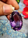 Amethyst Faceted Oval Pendant in Sterling Silver - Captivating Beauty and Artisan Craftsmanship