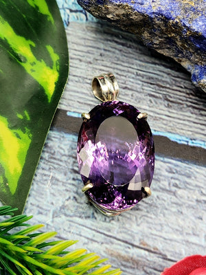 Amethyst Faceted Oval Pendant in Sterling Silver - Captivating Beauty and Artisan Craftsmanship