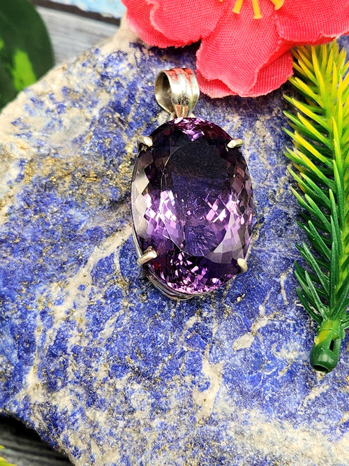 Amethyst Faceted Oval Pendant in Sterling Silver - Captivating Beauty and Artisan Craftsmanship