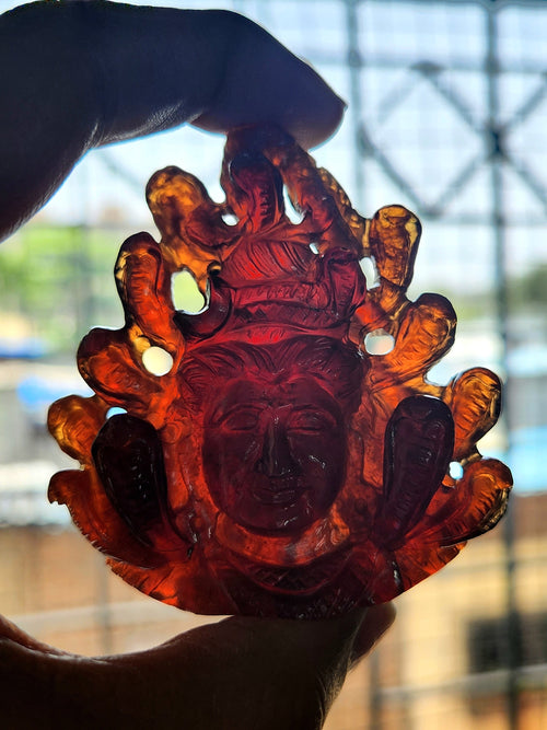 Handmade Lord Shiva Head Carving in Hessonite Garnet Stone - Reverence, Beauty, and Artisan Craftsmanship