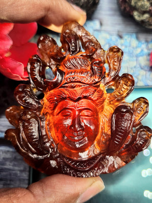 Handmade Lord Shiva Head Carving in Hessonite Garnet Stone - Reverence, Beauty, and Artisan Craftsmanship