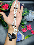 White Moonstone and Black Onyx Bead Mala with Black Onyx Phoenix Pendant - Symbolism and Craftsmanship