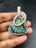 Labradorite Floral Carving Triangle Wire Wrapped Pendant - Unveiling the Intricate Beauty of Labradorite
