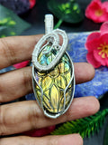 Labradorite Floral Carving Wire Wrapped Oval Pendant - Unveiling the Allure of Labradorite