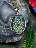 Labradorite Floral Carving Oval Pendant - Unraveling the Enigmatic Beauty of Labradorite