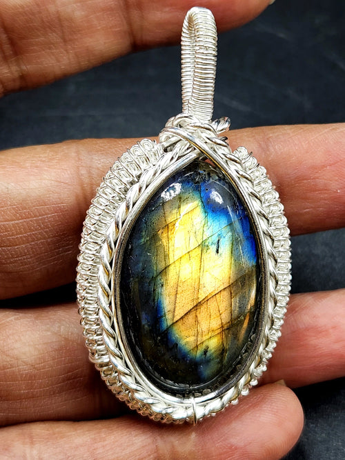 Labradorite Oval Pendant - Captivating Beauty in Wire-Wrapped Elegance