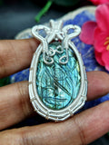 Labradorite Floral Carving Oval Pendant - A Fusion of Elegance and Artistry
