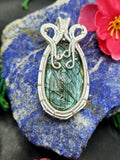 Labradorite Floral Carving Oval Pendant - A Fusion of Elegance and Artistry