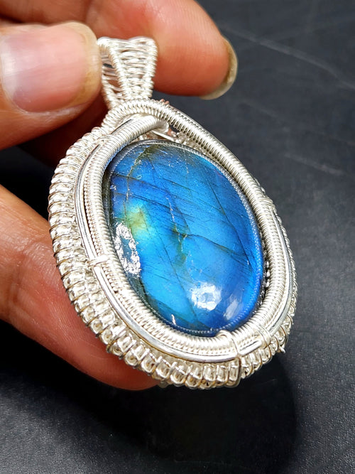 Labradorite Oval Pendant - Captivating Elegance in Wire-Wrapped Silver