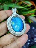 Labradorite Oval Pendant - Captivating Elegance in Wire-Wrapped Silver