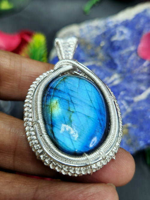 Labradorite Oval Pendant - Captivating Elegance in Wire-Wrapped Silver