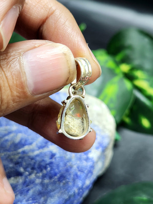 Ethiopian Opal Rough Pendant in sterling silver: Unearth the Raw Beauty of Opal Gemstone