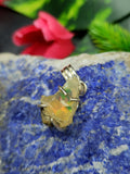 Ethiopian Opal Rough Pendant in sterling silver: Unearth the Raw Beauty of Opal Gemstone