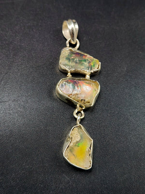 Ethiopian Opal Rough Triple Stone Pendant: A Tryst with Earth's Unrefined Elegance