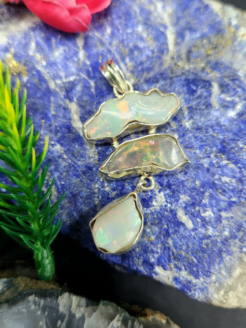 Ethiopian Opal Rough Triple Stone Pendant: A Radiant Symphony of Nature and Artistry