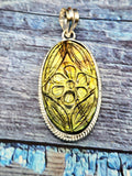 Labradorite Floral Carving Oval Pendant - Captivating Mystique Crafted by Artisans