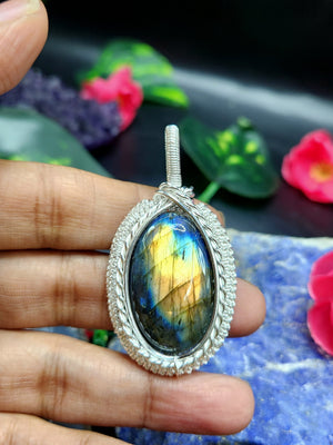 Labradorite Oval Pendant - Captivating Beauty in Wire-Wrapped Elegance