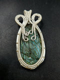 Labradorite Floral Carving Oval Pendant - A Fusion of Elegance and Artistry